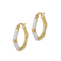 Gold and white hoop earrings on a white background