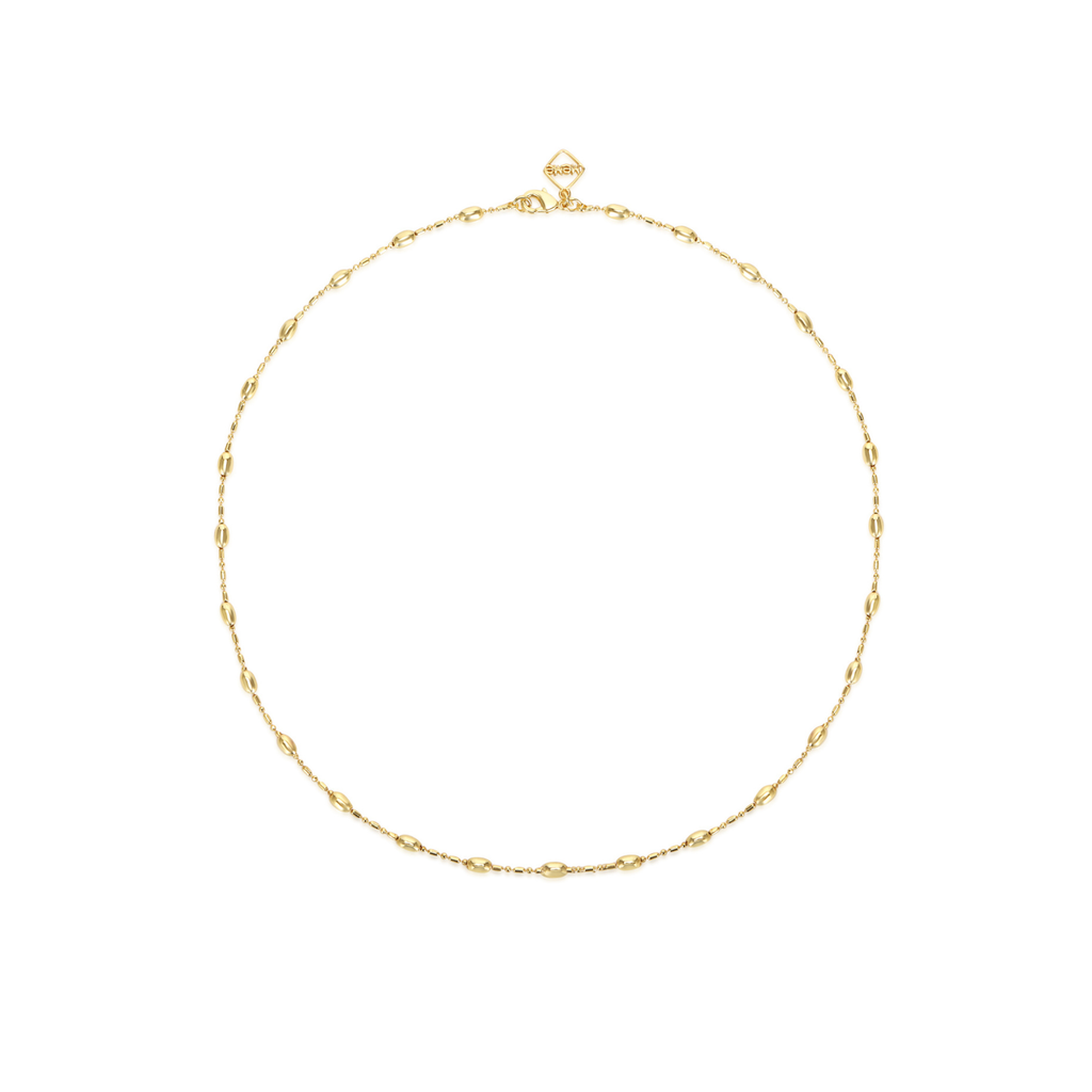 A delicate gold chain necklace with small oval links and a small faceted bead clasp, displayed on a clean white background.
