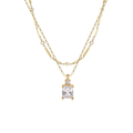 A gold double-strand necklace featuring a rectangular clear gemstone pendant with a bezel setting, accented by small round stones along the chain, shown against a plain white background.