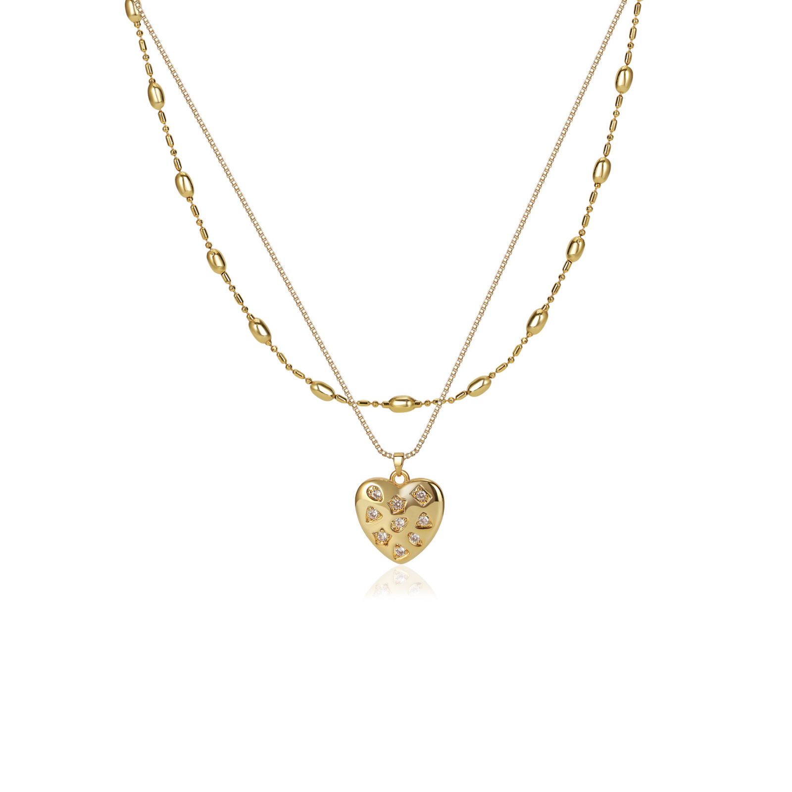 A gold double-layer necklace featuring a textured heart-shaped pendant adorned with small clear crystals, displayed on a clean white background.