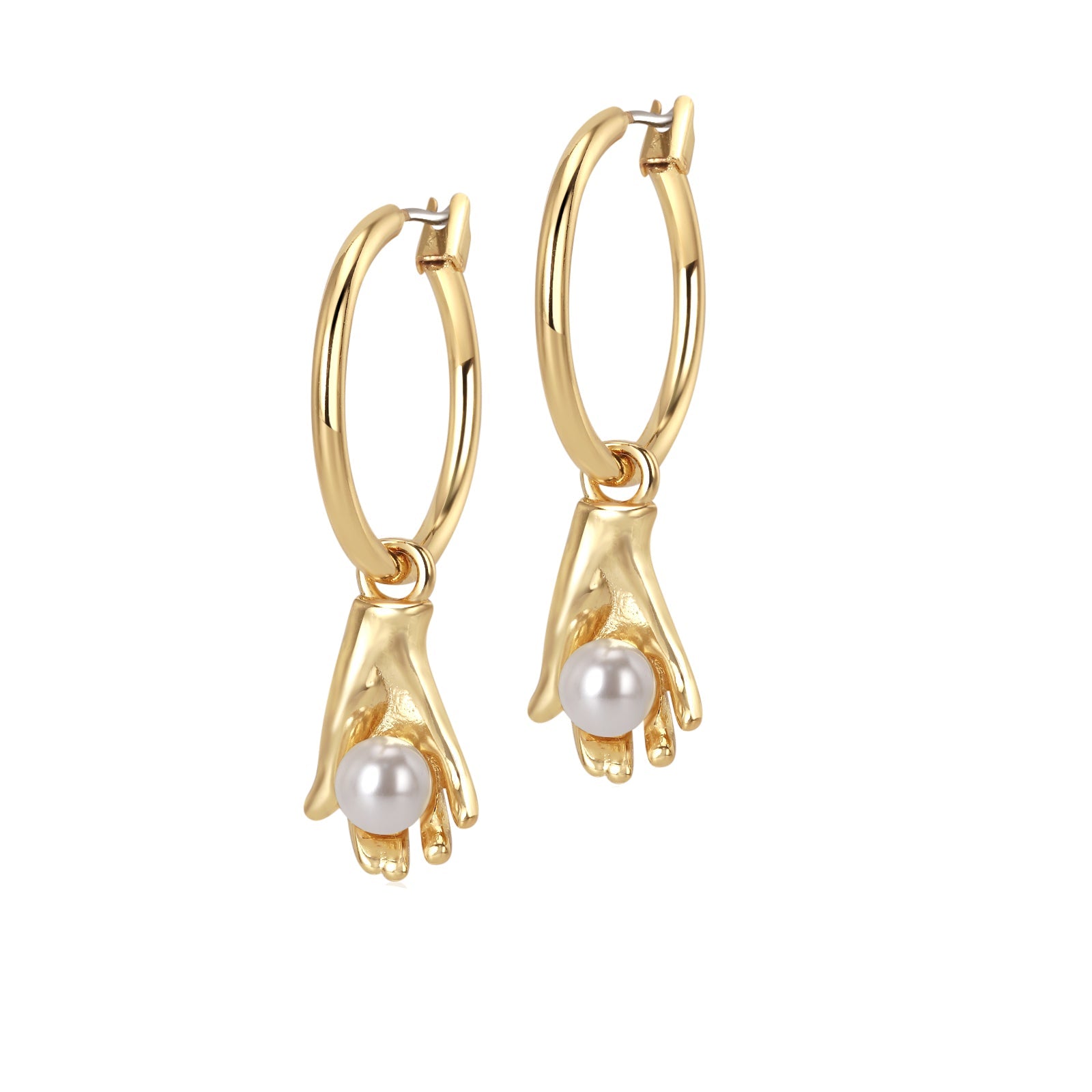 A pair of gold-plated brass earrings featuring sculpted hands holding faux pearls, with a hoop design.