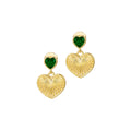 A pair of gold-colored earrings featuring heart-shaped designs with green stone setters.