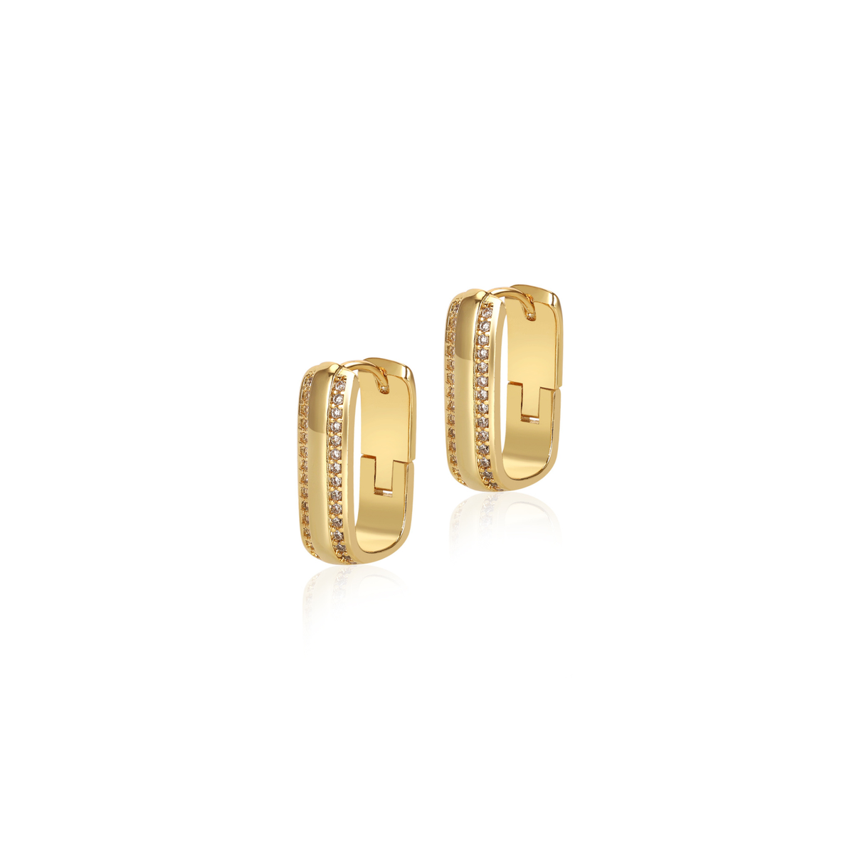 A pair of gold-toned rectangular huggie hoop earrings adorned with a row of small clear pavé stones along the front edge, displayed on a clean white background with a soft reflection.