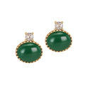 Pair of green stone earrings with gold and clear gemstone accents on a white background