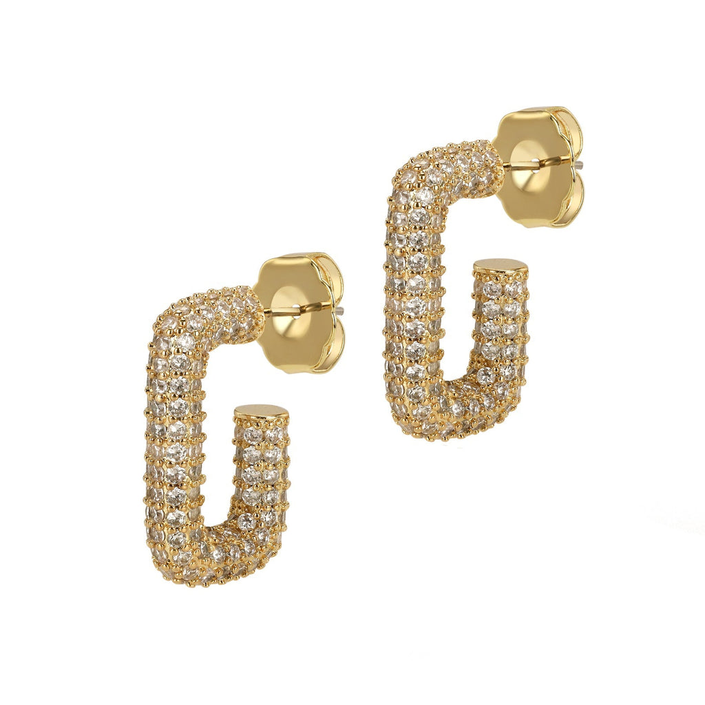 Gold hoop earrings with diamond-like stones on a white background