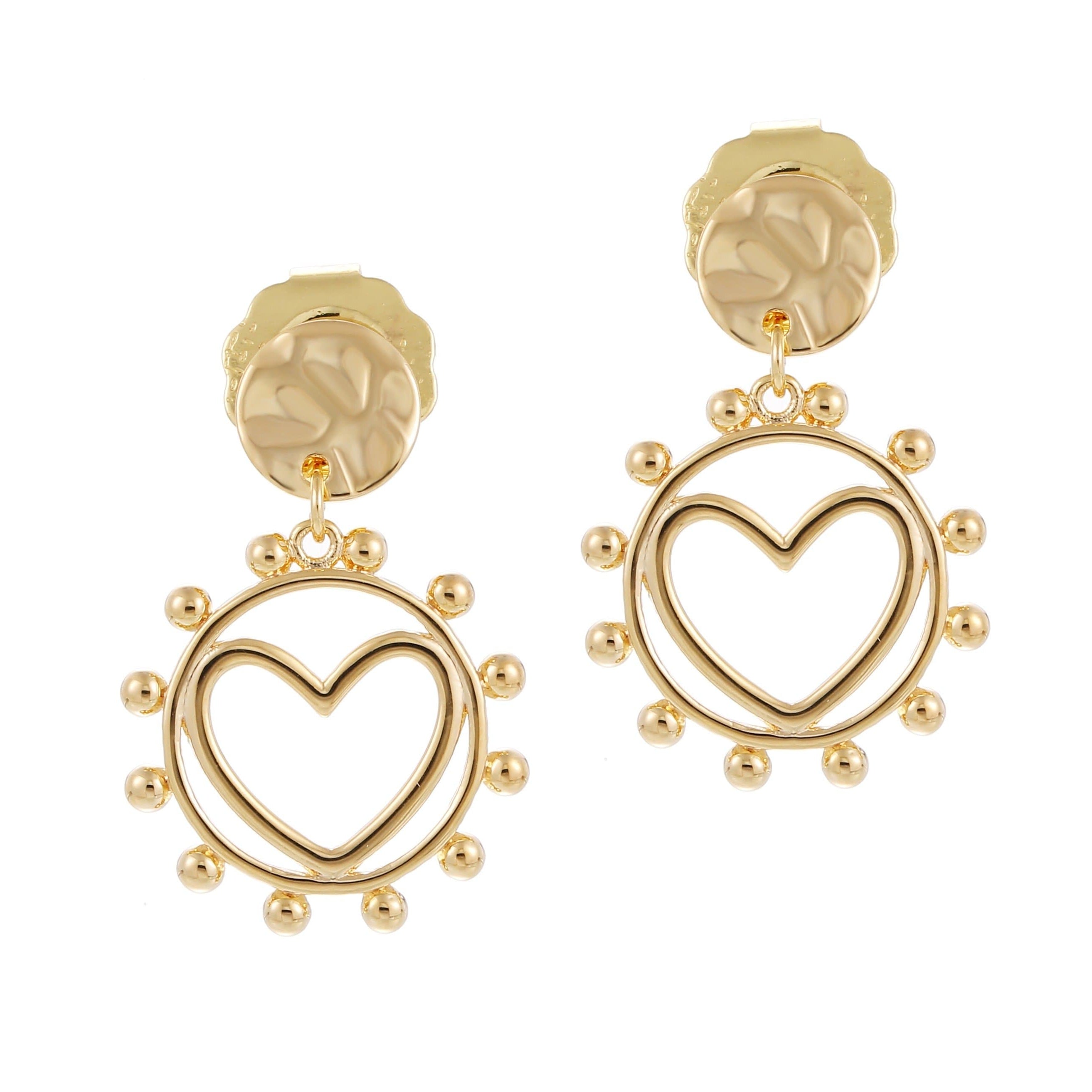 A pair of gold-colored earrings featuring a heart shape with a surrounding circle of small beads or pearls, attached to a larger textured circular finding.