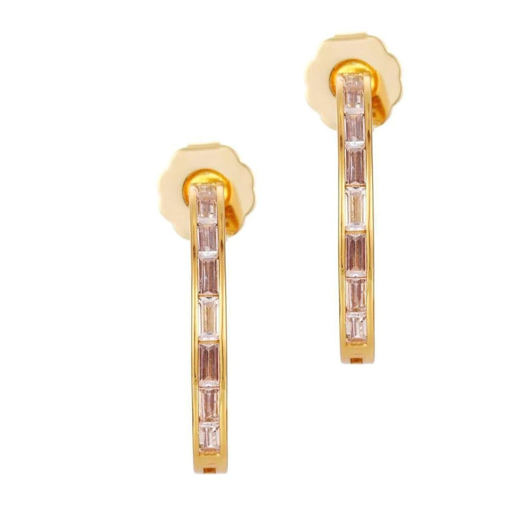 A pair of gold-colored earrings with clear crystal embellishments.